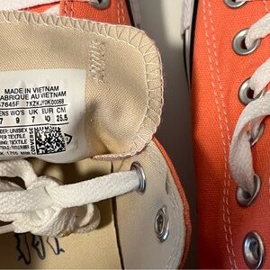 Salmon color Converse shoes
